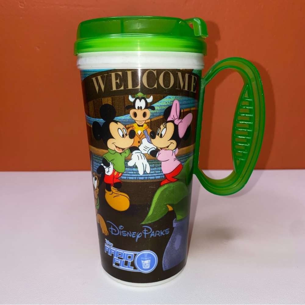 Disney Parks 2010 Rapid Fill Mug Travel Tumbler with Green Lid 16 oz